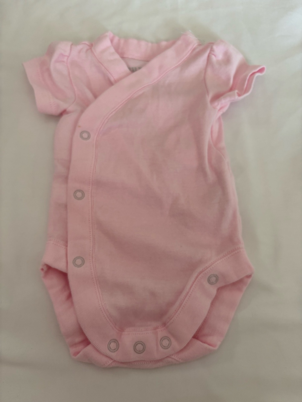 Soft Pink Infant One-Piece Bodysuit with Snap Front